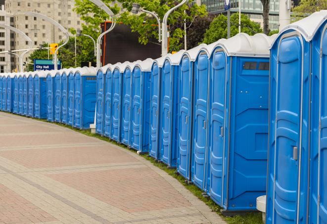 a row of portable restrooms at a fairground, offering visitors a clean and hassle-free experience in mexico